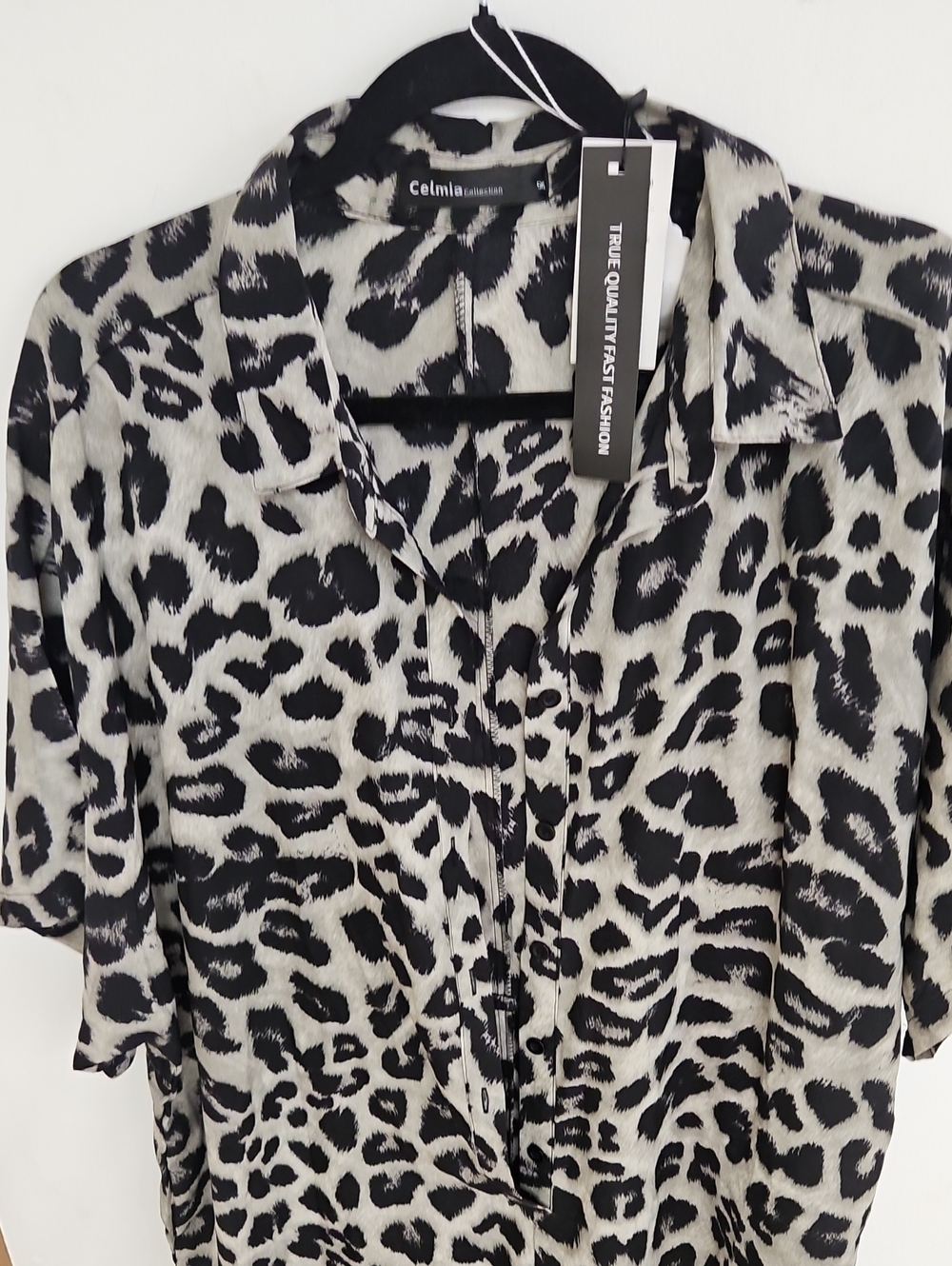 Celmia Black and White Leopard Print Button Sheer Jumpsuit